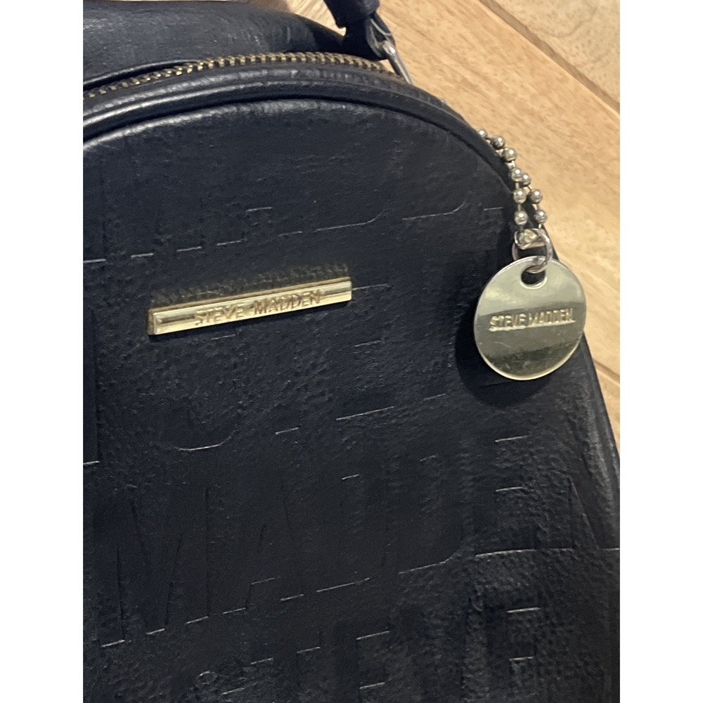 Steve Madden Small Backpack Embossed Logo Black & Gold Faux Leather Womens Bag - Picture 2 of 16
